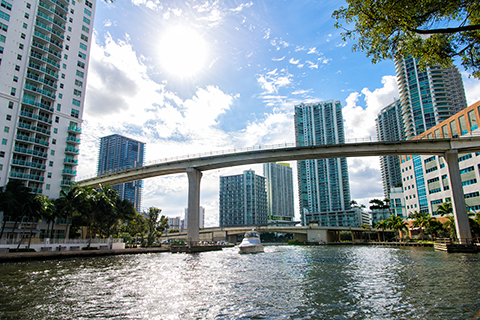 A stock photo. A cityscape view from the Miami River.
