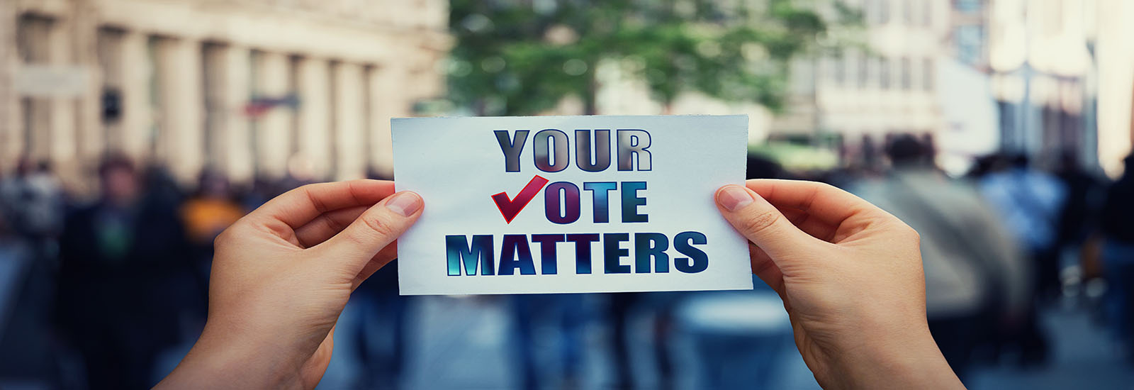 This is a stock photo. An up close image of a sign reading "your vote matters."
